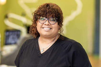 Orthodontic Team Member At Prosper Trail Orthodontics Posing In A Bright Clinic Environment
